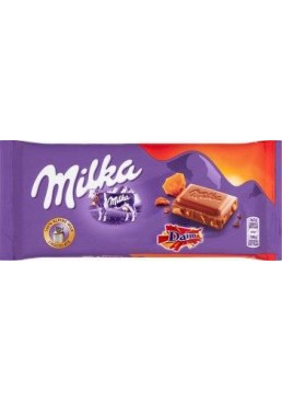 Шоколад Milka с кусочками миндальной карамели 100г